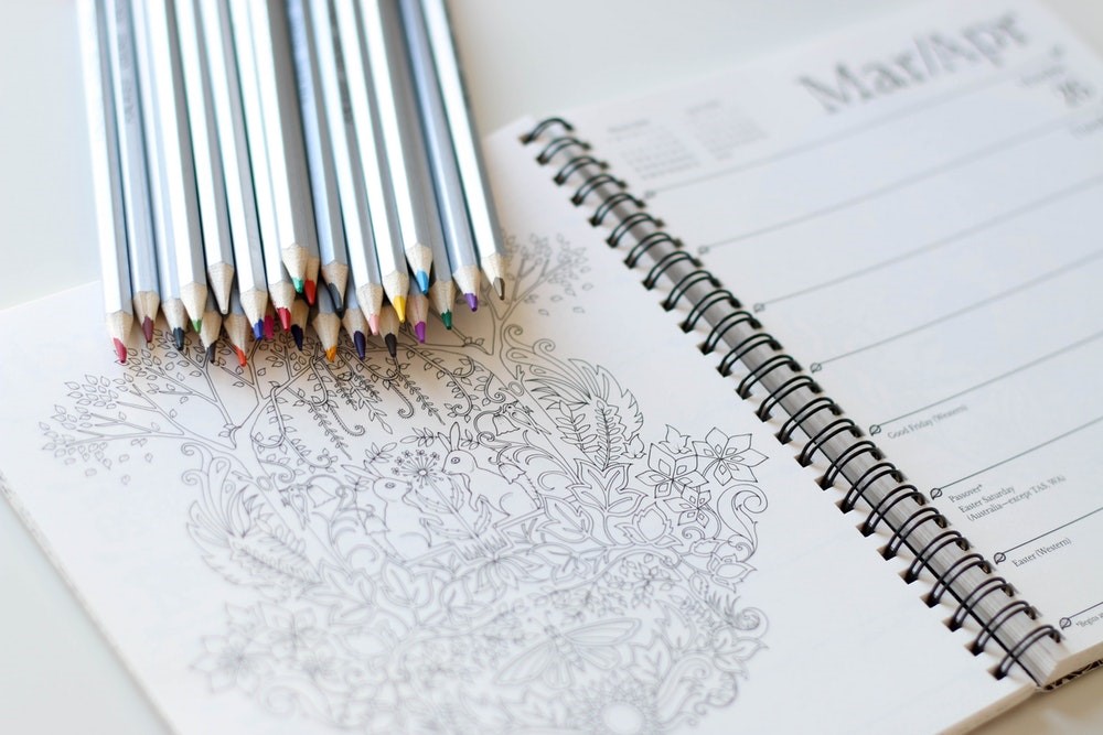 long-haul flight - art book and crayons