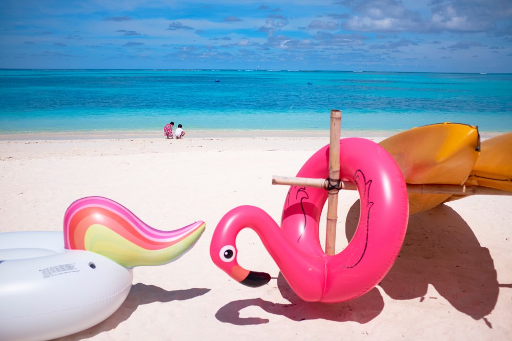 kids inflatables on beach: pack for your single mums holiday