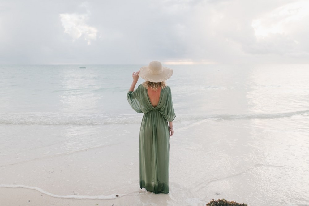 mum in maxi dress on beach