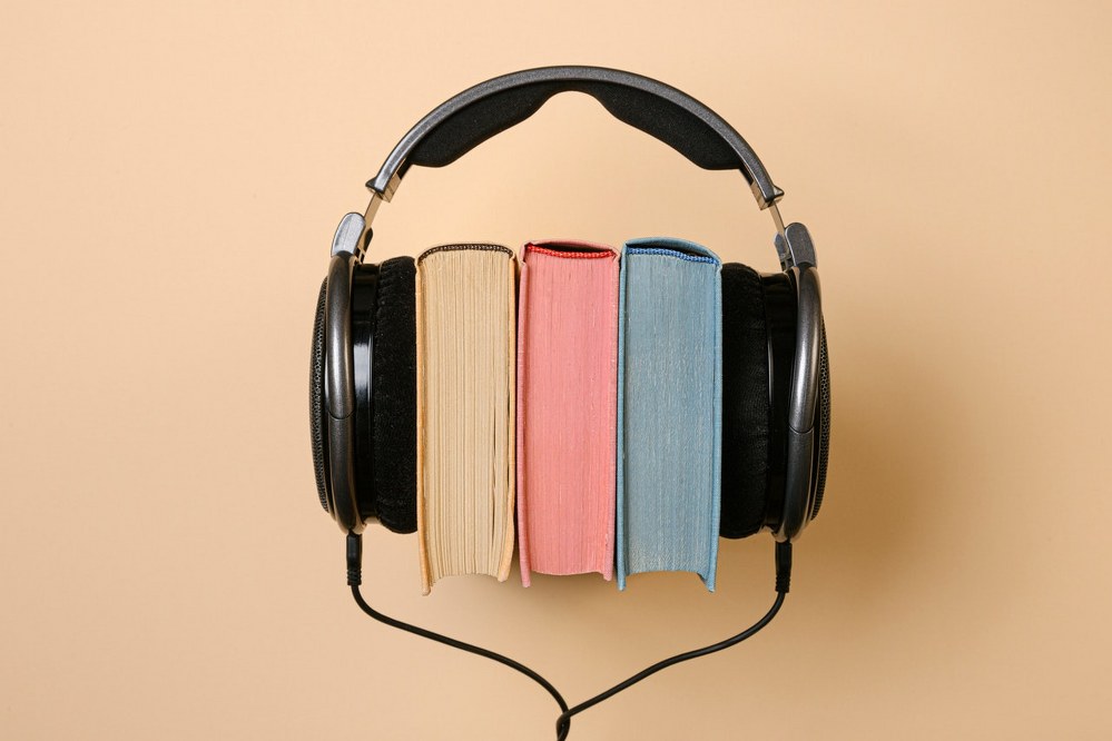 books and headphones - essential travel items