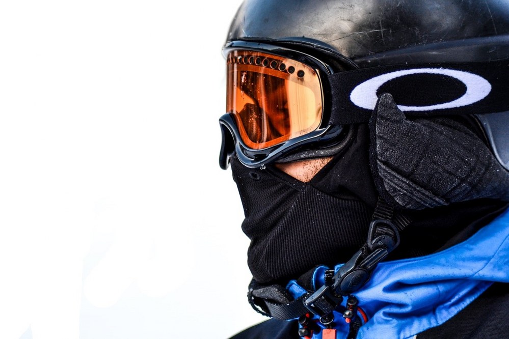 man wearing scratched helmet and goggles