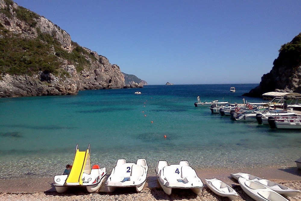 Corfu beach with pedalos in the Mediterranean