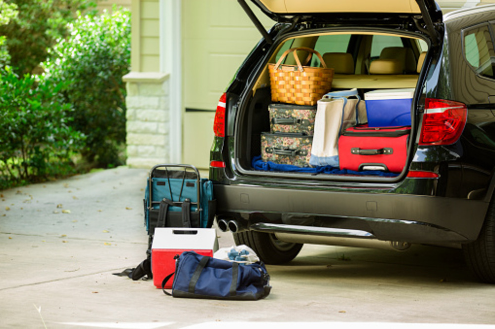 car full of luggage - driving on holiday with kids