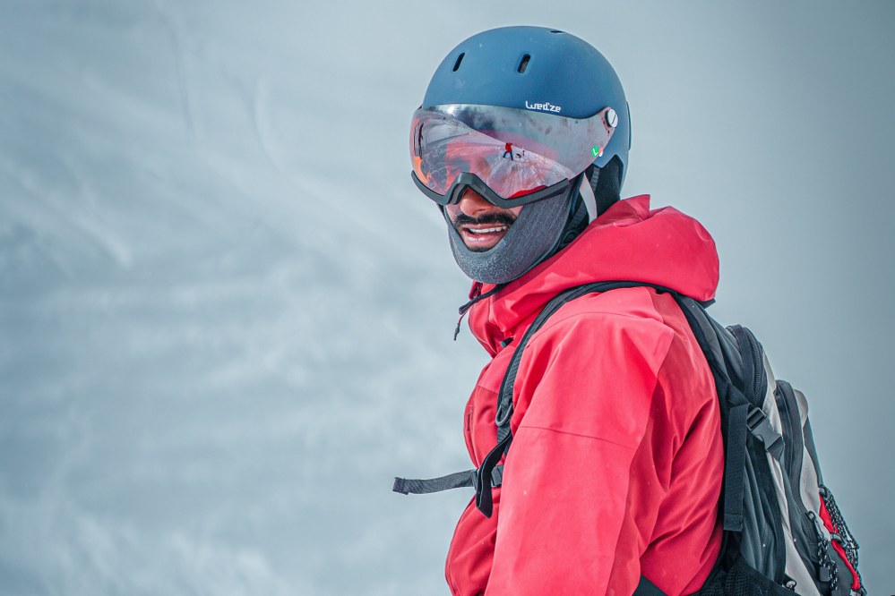 man wearing ski helmet with visor