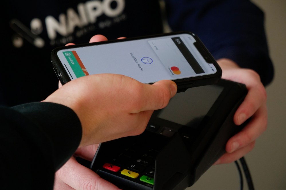 person paying by phone